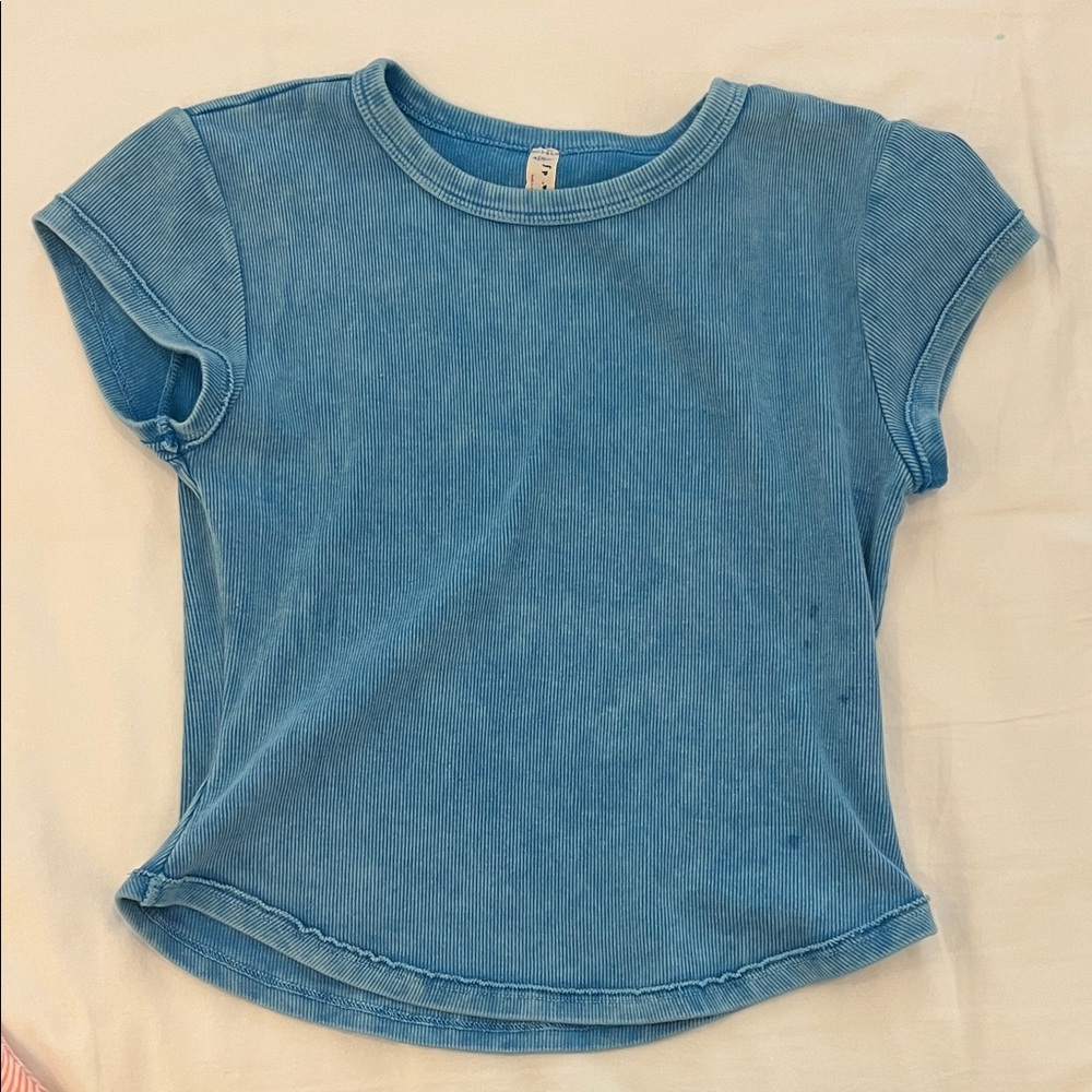 Free people baby T with small stain on front and back
